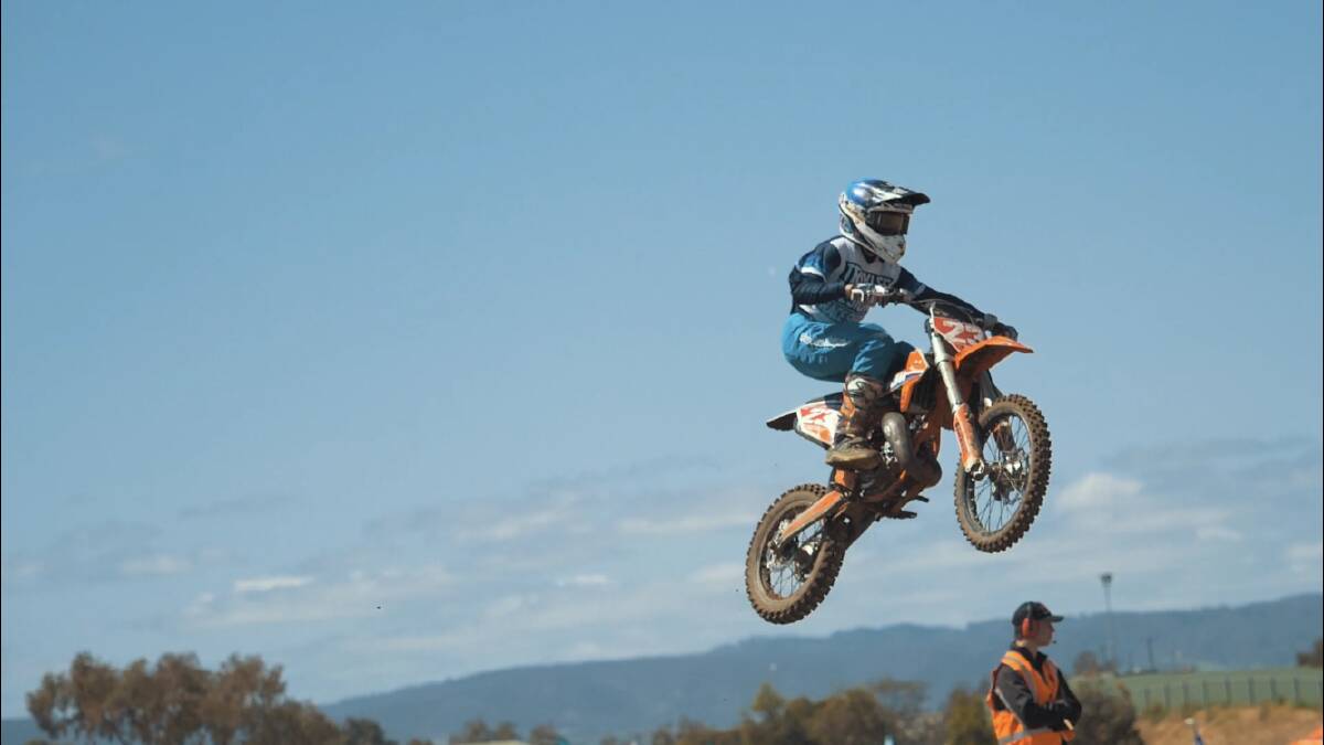 Racing at the Australian Junior Motocross Championships last month.