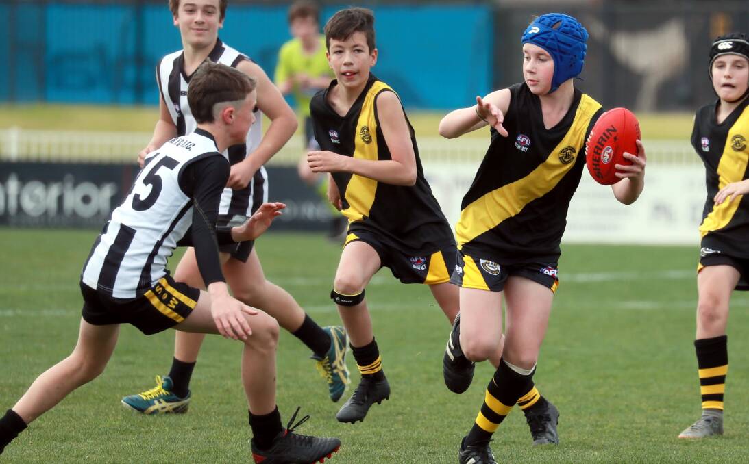 STRONG DISPLAY: Wagga Tigers' Sam Clarke gets ready to deliver a 'don't argue' in the under 13s game against The Rock-Yerong Creek at Robertson Oval last Sunday. Picture: Les Smith