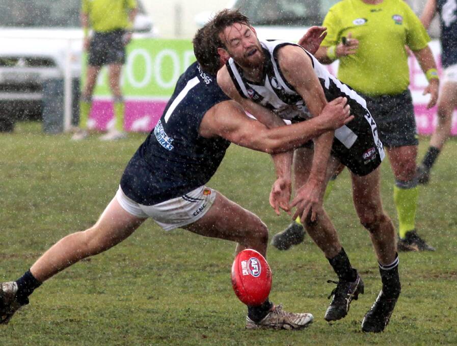 ALL SET: Coleambally co-coach Luke Hillier in his days with The Rock-Yerong Creek, playing against the Blues in a final at Gumly. 