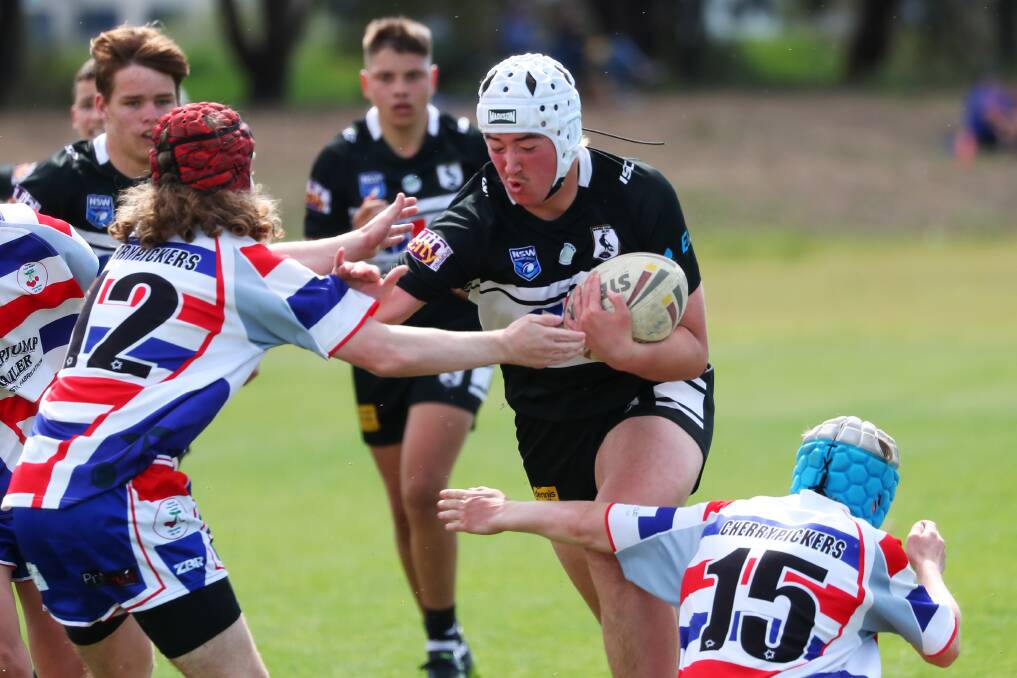 ON THE CHARGE: Wagga Magpies' Mason Tak is a handful for the Young defence in their under 15s game on Saturday. Picture: Emma Hillier
