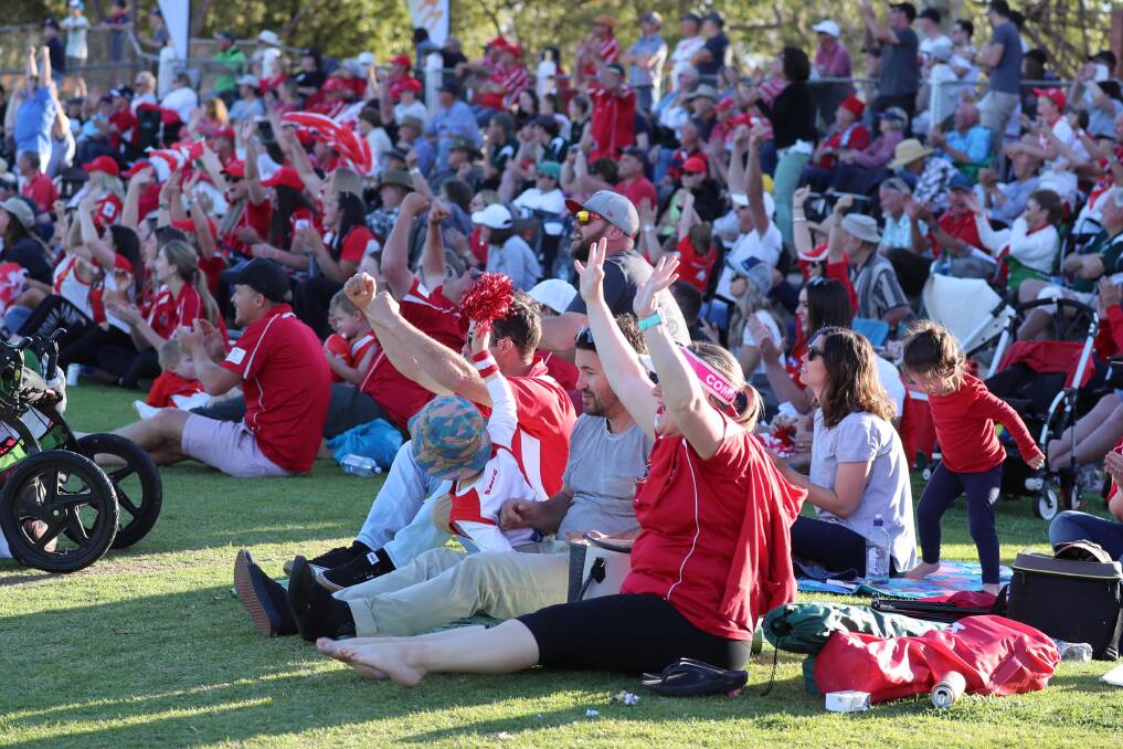 Collingullie-Glenfield Park supporters celebrate the grand final victory. Picture: Les Smith