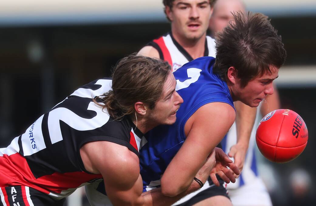 GOTCHA: North Wagga's Corey Watt wraps up Roo Rob Krause in North Wagga's last minute win. Picture: Emma Hillier