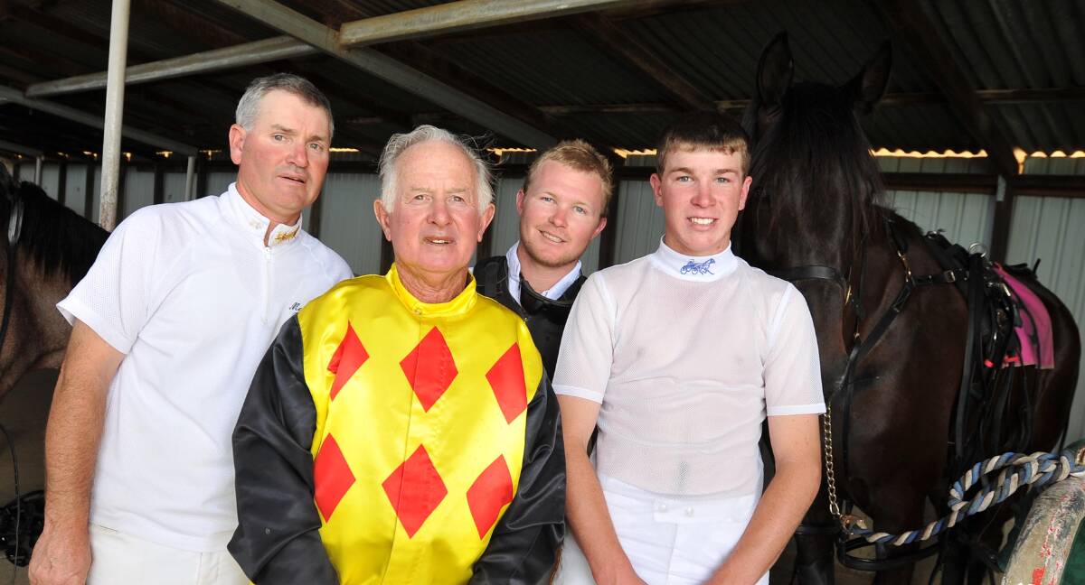 Norm Diebert senior in 2012 with son Malcolm (left) and grandsons Andrew Pitt and Paul Diebert (right). 