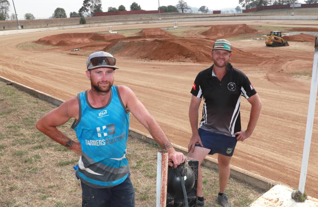 ON TRACK: Wagga Motorcycle Sports Club officials Trent Harmer and Adam Beck at the Wagga Speedway this week preparing to host the first round of 'Sultans of Slide', for the NSW Flat Track Cup on Saturday night. Picture: Les Smith