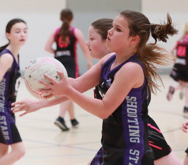 Under 11s: Shooting Stars Pink Diamonds v Nixons Firebirds. Pictures: Les Smith