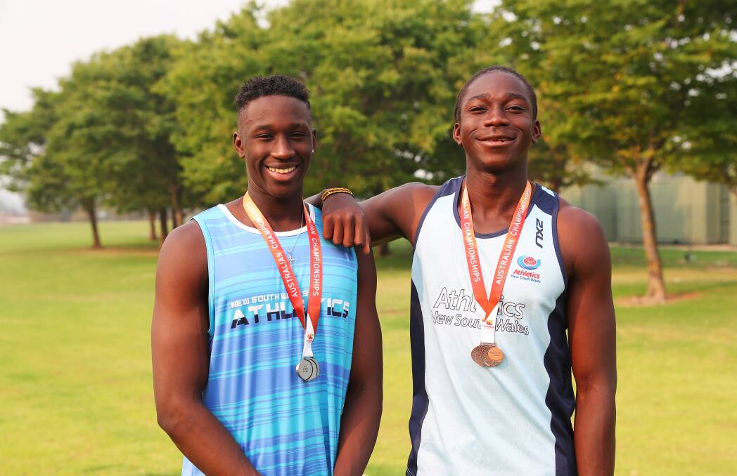 Godfrey, left, will begin 2020 recovering from surgery on his hamstring. He hopes to back for national juniors at the end of March, which is Gerard's main goal after his impressive effort in the hammer throw at Australian All Schools. Picture: Emma Hillier