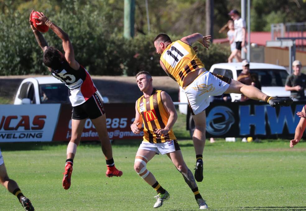 NICE MARK: North Wagga forward Dayne Hancock takes a grab in their narrow loss to East Wagga-Kooringal on Saturday. Picture: Les Smith