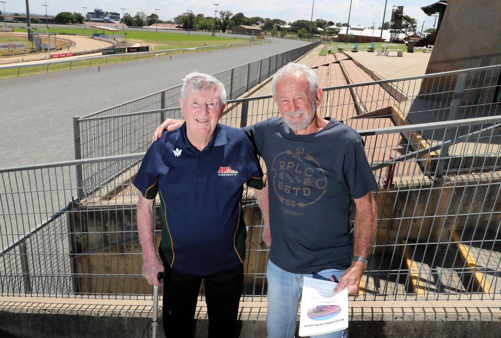 MEMORY LANE: Former Wagga Harness Racing Club president Mick Mullins (left) and secretary Graham 'Curly' Ion at the Showground. They oversaw the new track's arrival in 1992 and on Friday bade farewell to the venue ahead of tonight's final meeting. Picture: Les Smith