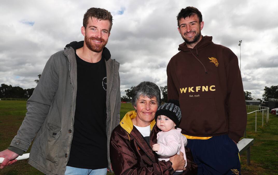 FAMILY TIES: Nick Hull (right) with brother Josh, mum Tonie and niece Callie, 8 months. Picture: Emma Hillier