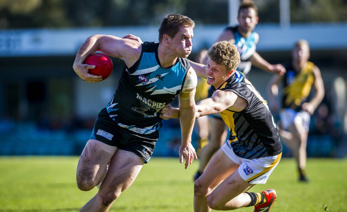 JET ENGINE: Jack Harper surges past an opponent
while playing for Belconnen in Canberra a few
years ago. Picture: Dion Georgpoulos