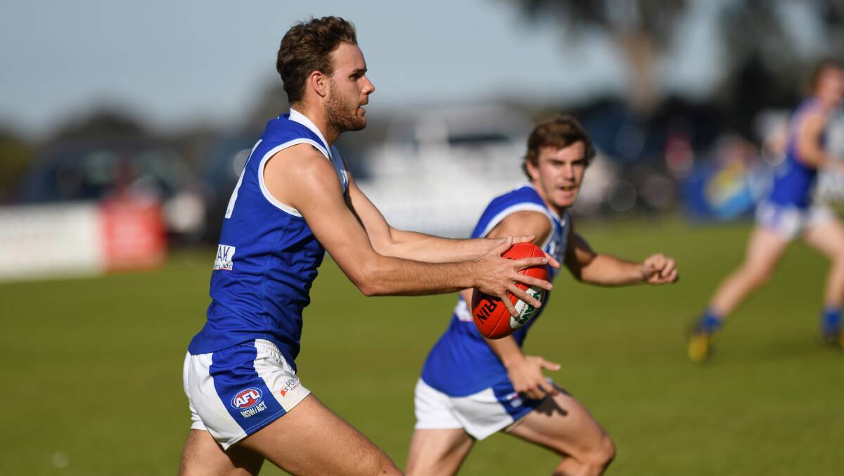 CSU's Joe Stapleton drives the Farrer League forward in the thrilling one-point loss to Hume League this year.