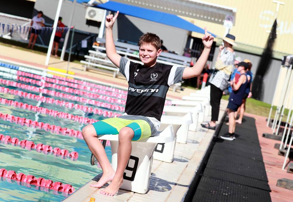 ALL SMILES: Baylee Edwards celebrates after breaking a record that had stood for nearly 40 years at the Wagga High swimming carnival on Thursday night. Picture: Les Smith
