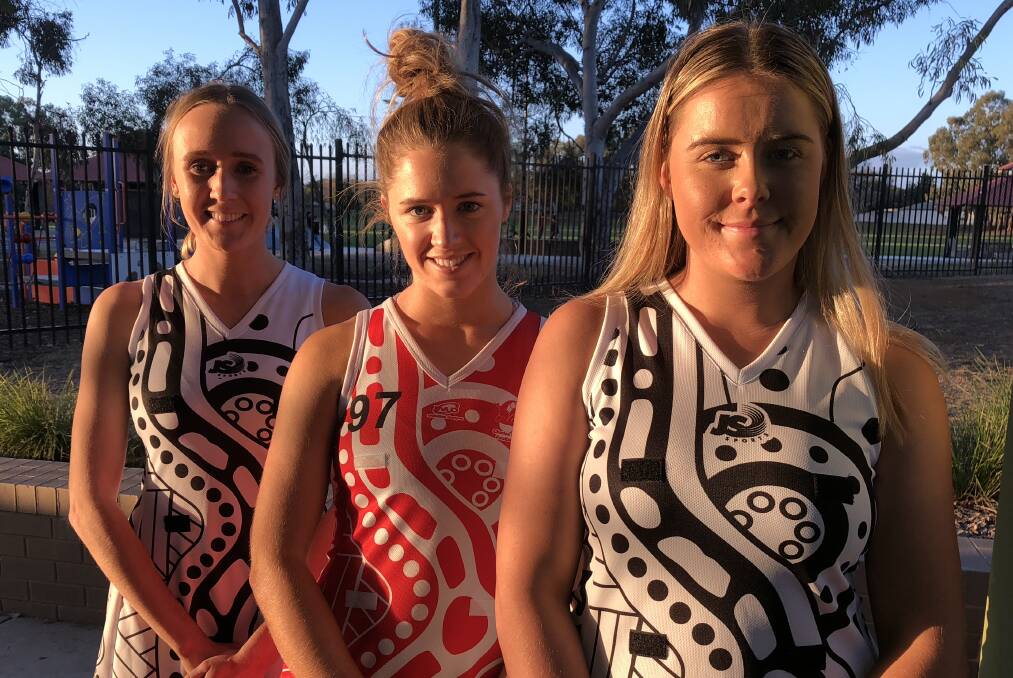 UNBEATEN RIVALS: The Rock-Yerong Creek's Ella Fellows (left) and Kadison Hofert (right) flank Charles Sturt University's Isobel Cleary ahead of their top-of-the-table encounter at Victoria Park on Saturday. 