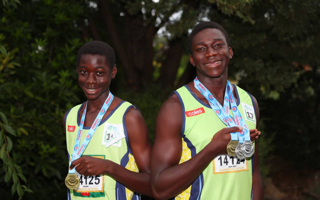 THAT'S GOLD: Wagga's Daniel (left) and Gerard Okerenyang were both crowned state champions in field events at the NSW Junior Athletics Championships last week. Picture: Emma Hillier