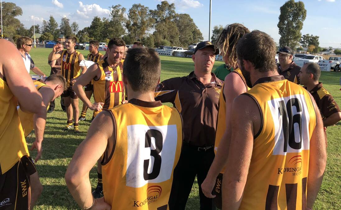 FAMILIAR FEELING: Matt Hard talks to East Wagga-Kooringal players during a break at Gumly in 2018. The Hawks are hoping the return to training is a sign of better things ahead.
