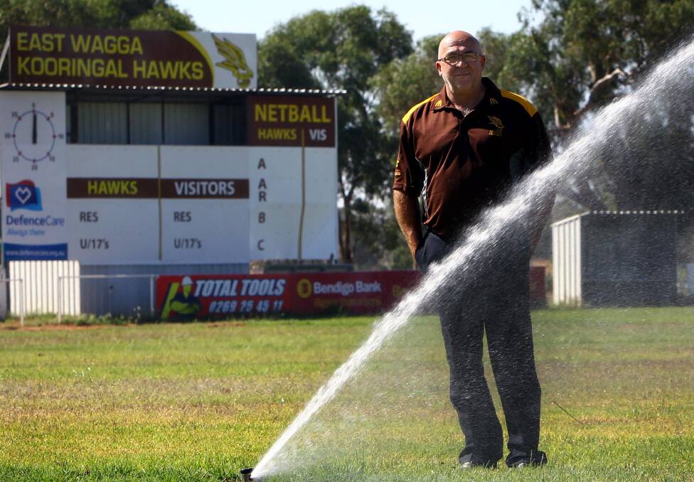 JUST ADD WATER: Steve Absolum at Gumly Oval just after taking on the East Wagga-Kooringal presidency at the end of 2015. The Hawks broke a 34-year premiership drought the following year. Picture: Les Smith