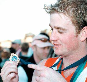 BEST-ON: Rivcoll midfielder James Millikan with the Nitschke-Schmidt Medal after he was named the best player in the grand final. 