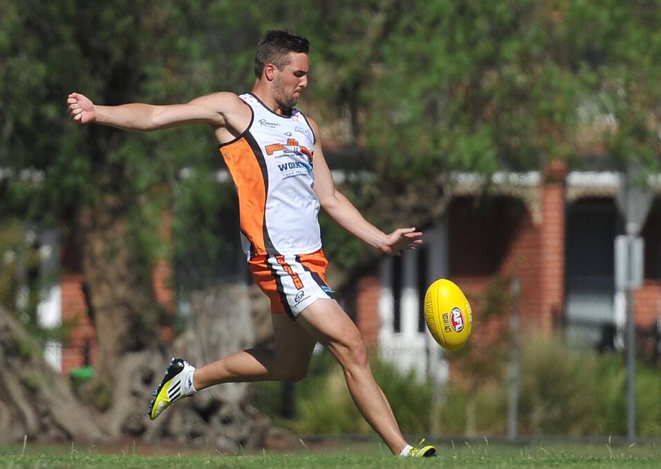 Suckling shows off his kicking style in a Wagga sports event in 2012.