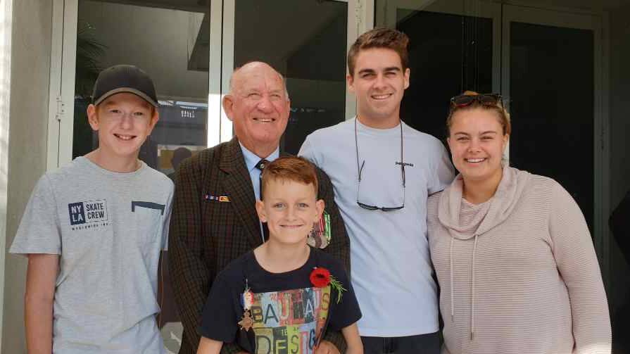 FAMILY MAN: Bill Jacob with his grandchildren (from left) Ben, Drew, Sam and Anna.