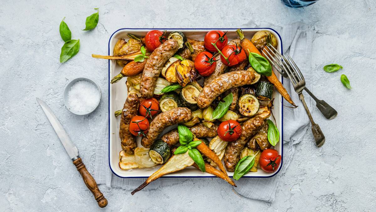 Winter vegetable and sausage tray-bake. Picture: Melissa Darr