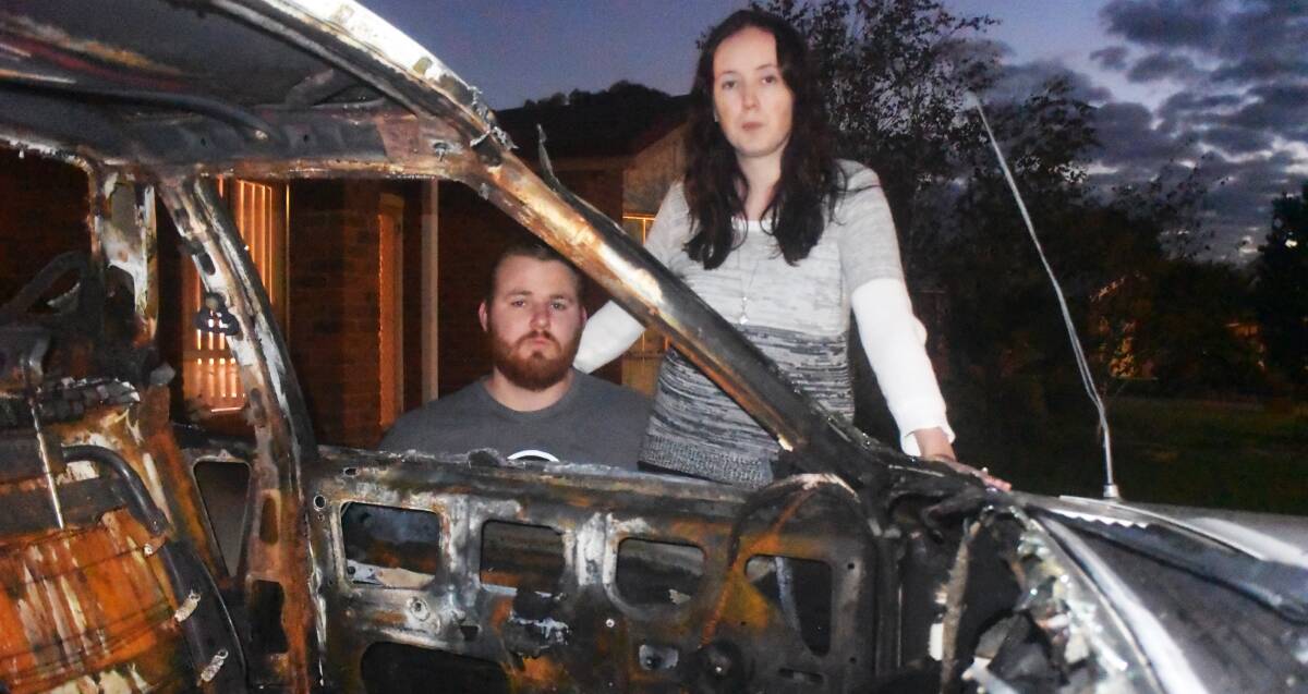 SHOCKED: Nathan and Sarah Curtis had this XF Falcon stolen from their Tolland home. It was later found at Northcott Parade dumped and torched. Picture: Ella Smith 