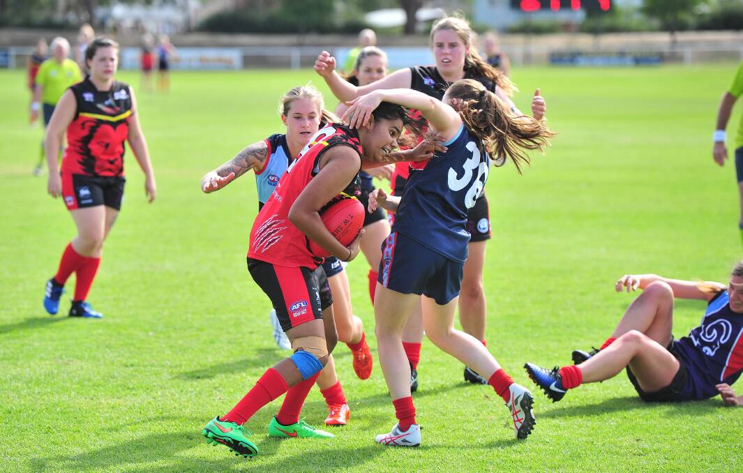 BREAKING FROM PACK: Experienced forward Naomi Boney debuted for the Riverina Lions in round one, and kicked a goal against ADFA Rams at McPherson Oval on April 8. Picture: Kieren L. Tilly
