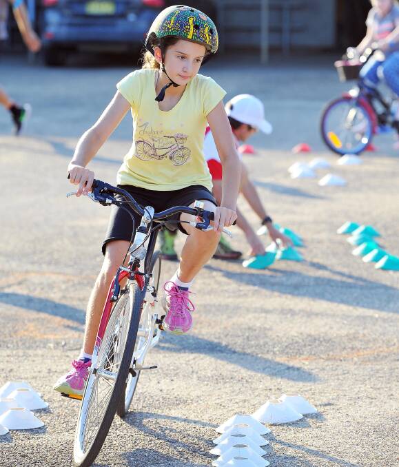 GETTING INVOLVED:  Mikayla Anderson, 11, at "Let's Ride" bike classes at Wagga PCYC in April, one of the many initiatives that has helped to boost junior cycling participation over the past year. Picture: Kieren L. Tilly