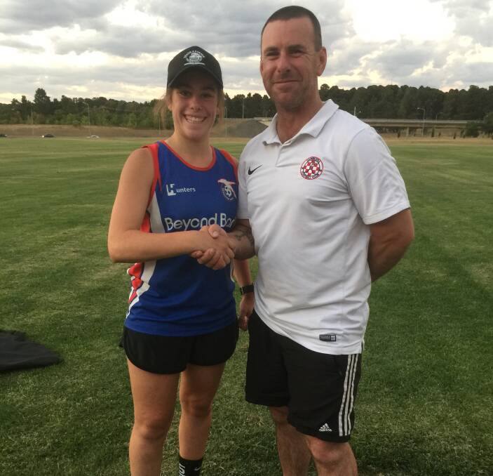 KEEN TO START: Grace Di Trapani and Canberra FC first grade coach Mark Risteski at a training session on Tuesday. She will juggle her final year at school with soccer commitments, travelling from Wagga twice a week