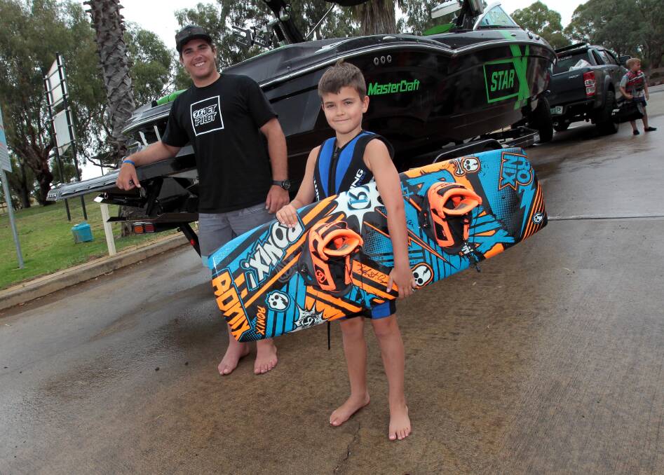 EAGER: Billy Denson, 11, of Tumut keen to get out on the water with national champion Tony Iacconi at Lake Albert on Thursday. Pictures: Les Smith