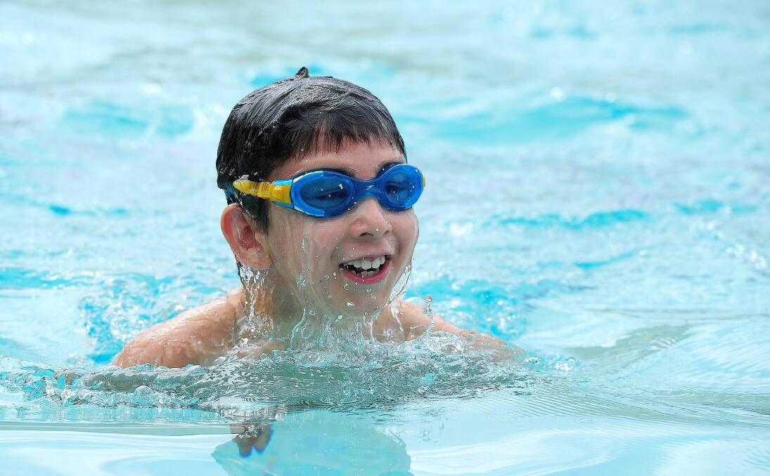 ALL SMILES: Tom Swann, 7, one of the youngest kids to take the plunge into the pool at Oasis at the Mater Dei primary swimming carnival on Monday. Picture: Kieren L. Tilly
