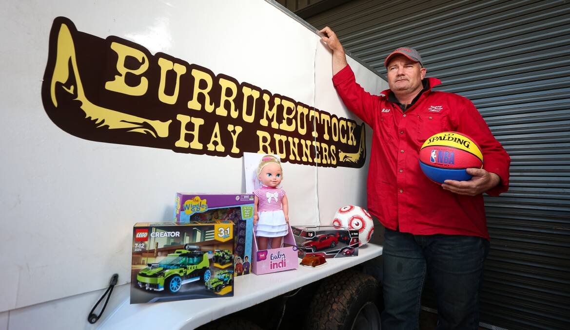 CARING FOR KIDS : Burrumbuttock Hay Runners founder Brendan Farrell is heading off on his first official toy run to help lift the spirits of families in outback NSW. Picture: JAMES WILTSHIRE