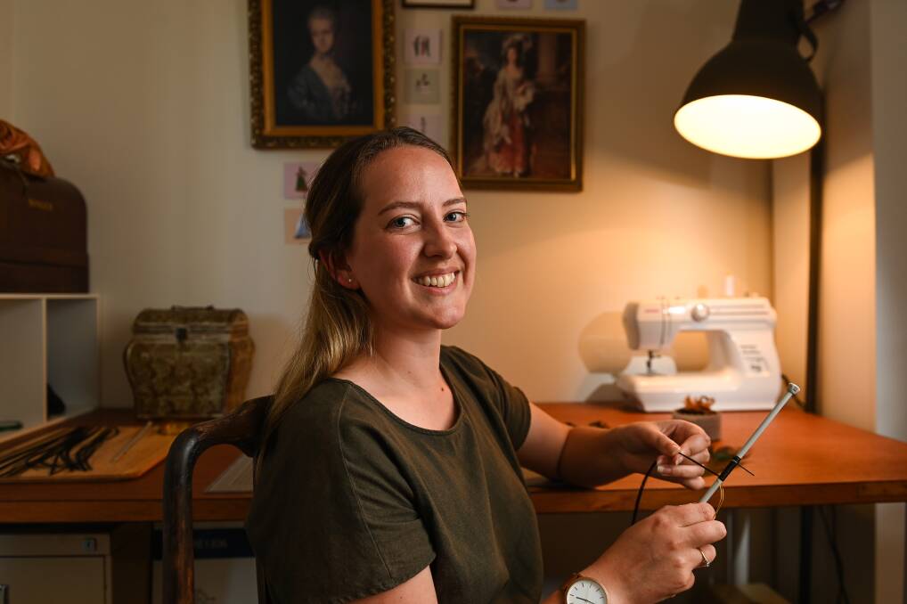 Bygone ways ... Hollie Barclay, 28, is fascinated by Victorian hair work and other parlour crafts including cross-stitch and dress-making. She will be at Jindera's Forgotten Trades Festival this Sunday. Picture by Mark Jesser