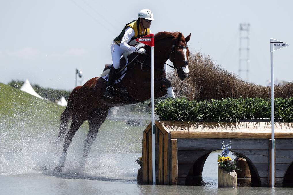 HISTORY IN THE MAKING: Culcairn born and raised Andrew Hoy aboard the French-bred chestnut gelding Vassily de Lassos during Sunday's cross-country phase of equestrian eventing at Tokyo ... the Aussie team went on to secure a silver medal.