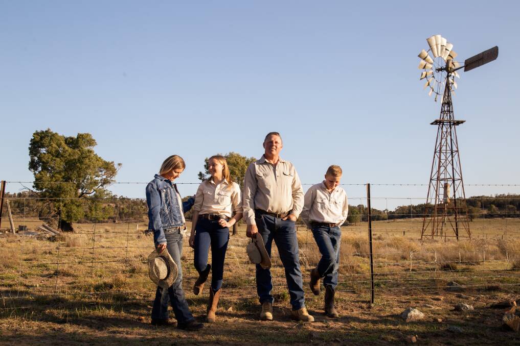 TOUGH TIMES: Elzette Connan, pictured with her family at their Cumnock property - they have been forced to sell off 90 per cent of their cattle and 50 per cent of their sheep to keep going in the drought.