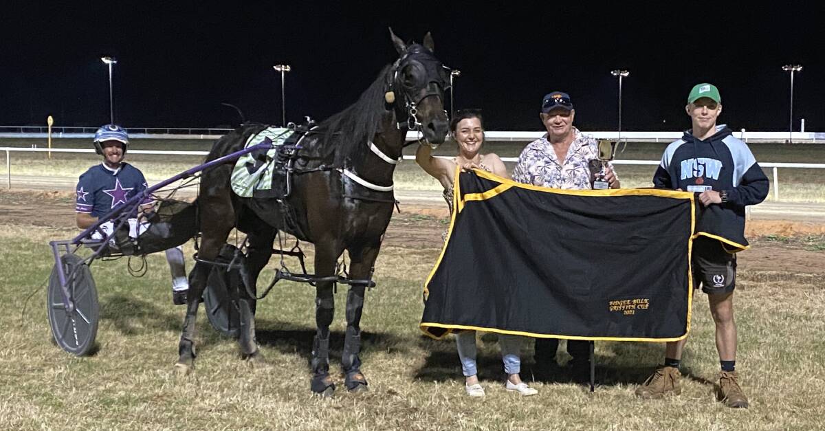 WINNERS: Nerano driven by Blake Jones with trainer Ellen Bartley and owner Michael Boots after success in Griffith on Saturday night. PHOTO: Liam Warren