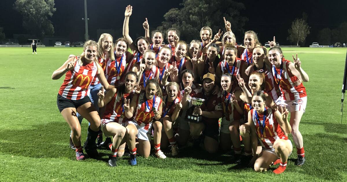CHAMPIONS: CSU have defended their AFLW title after a commanding display against Griffith in the decider. PHOTO: Liam Warren