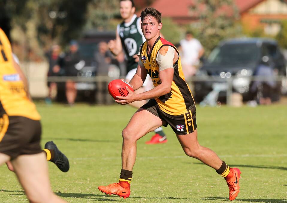 Brock-Burrum midfielder Ron Boulton in action for Hume against Ovens and King at Howlong last season.