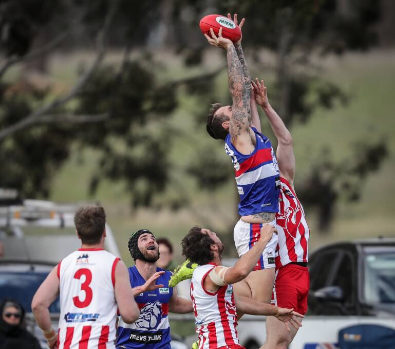 CLASS ACT: Trent Castles marks strongly against Beau Connell in Jindera's 17-point victory at Walbundrie on Saturday. Pictures: JAMES WILTSHIRE