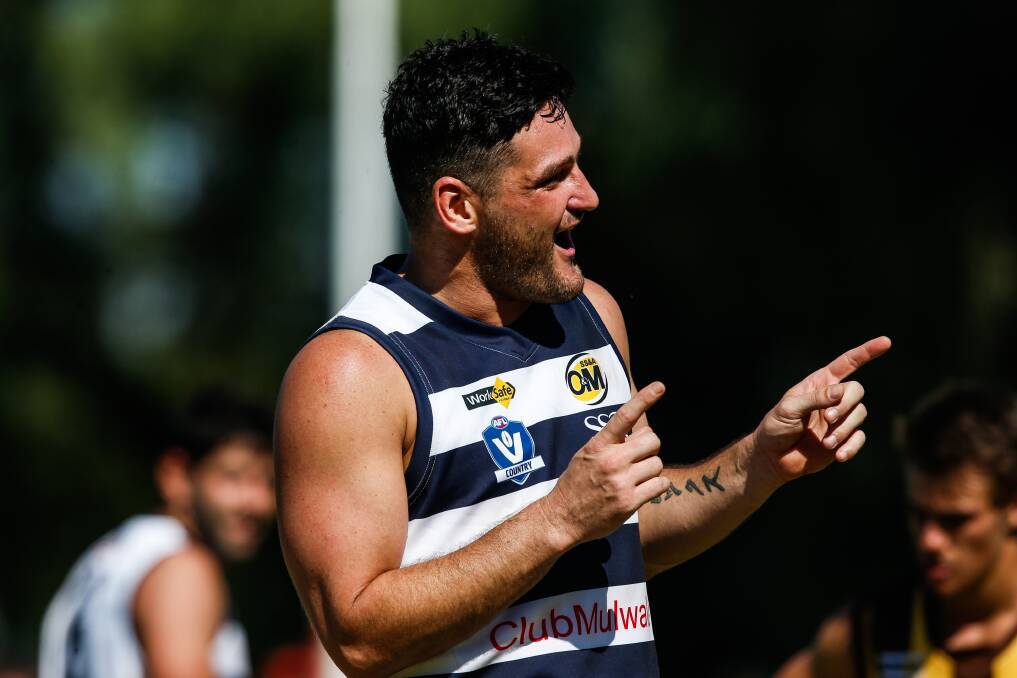 The ultimate showman: Brendan Fevola celebrates one of his many goals for Yarrawonga. He rates the club's premiership in 2012 as one of the highlights of his career.