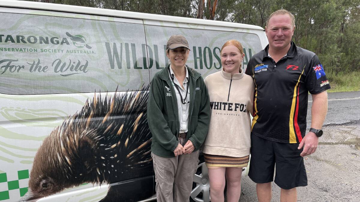 Liz Arthur, supervisor for Tarongas Wildlife Hospital, with Mikayla Pullan who named Gerald, and Gerald's rescuer James Pullan at Cattai. Picture: Sarah Falson