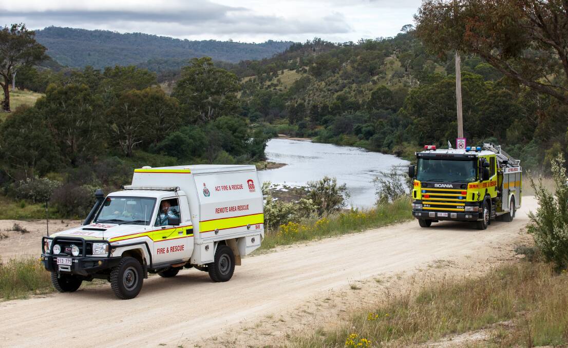 Emergency services personnel at Tharwa Sandwash, where two people drowned on Saturday. Picture: Sitthixay Ditthavong