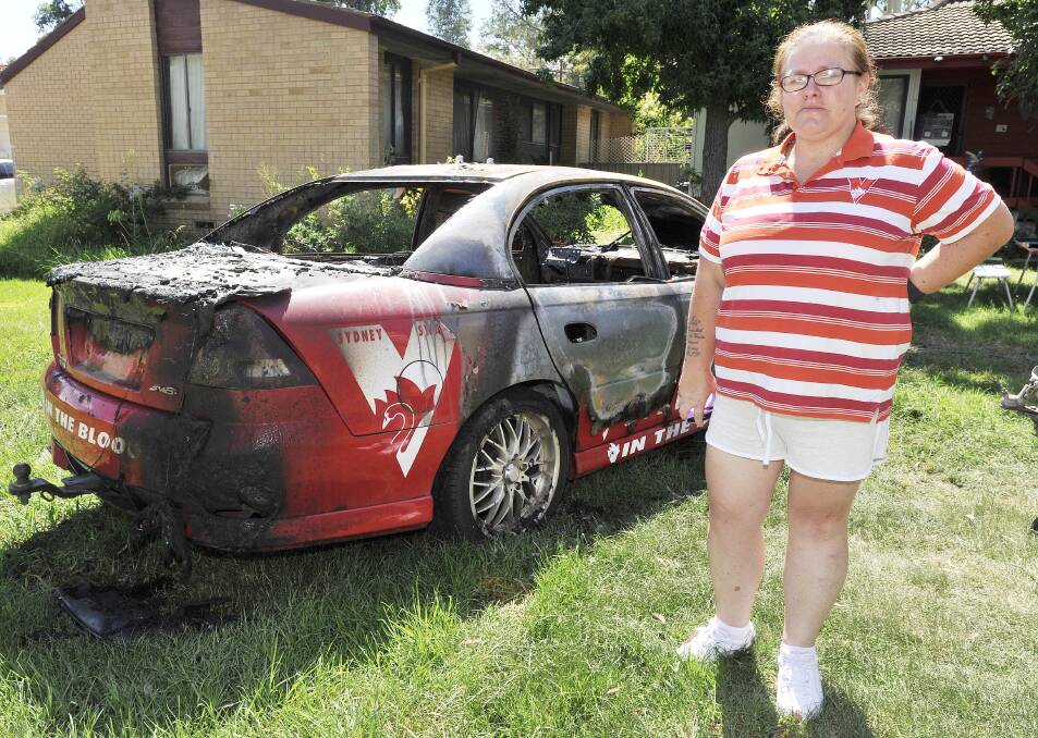 Heartbreak: Heather Tilden has been left devastated after her beloved V8 commodore - a birthday present - was left a burned-out shell. Picture: Kieren L.Tilly
