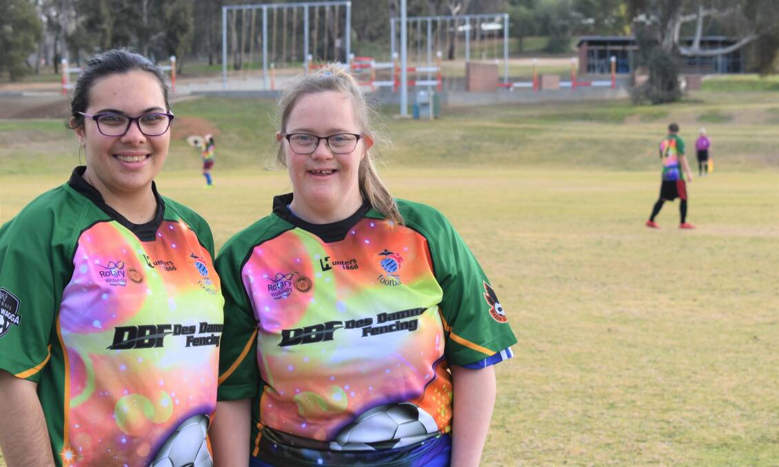 Goal to have fun: Kiara Vella and Jacqui Meyers said a soccer match against a Kapooka team was a real kick. Picture: Steff Wills 