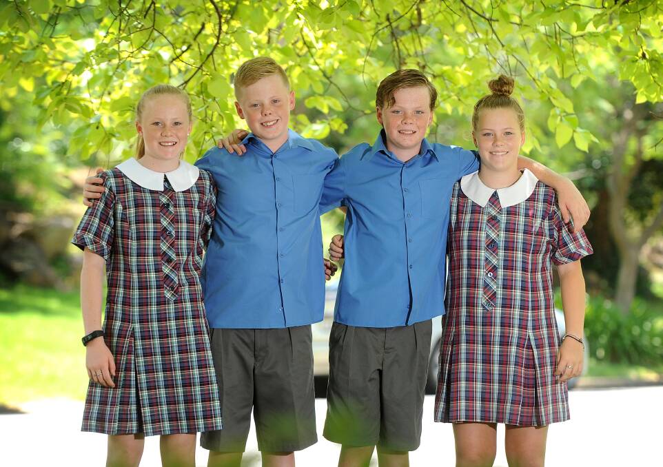 Teenagers times four: Wagga's quads Priyah, Harry, Baxter and Ruby Ceeney, 11, are hitting high school this year, starting Kildare Catholic College this week. Picture: Laura Hardwick  