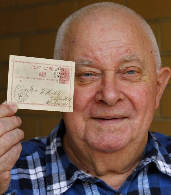 Stamp in time: Peter Simpfendorfer - with his 1890 postcard, stamped by an ancestor from Walla Walla - invites fellow collectors to the Stamp and Coin Fair this weekend. Picture: Les Smith