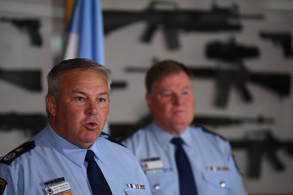 Pardon to hit target: NSW Police Deputy Commissioner Jeff Loy (right), with Deputy Commissioner Gary Worboys on Wednesday announced the New South Wales Government would conduct a gun amnesty. Picture: Dean Lewins