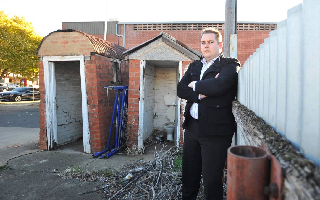 Back in time: In 2012, Dave Skow said he was fed up with drunks urinating at the back of the RE/MAX premises on Forsyth Street, on the fence closest to the street, as well as in and on the outdoor toilets at back of the car park.
