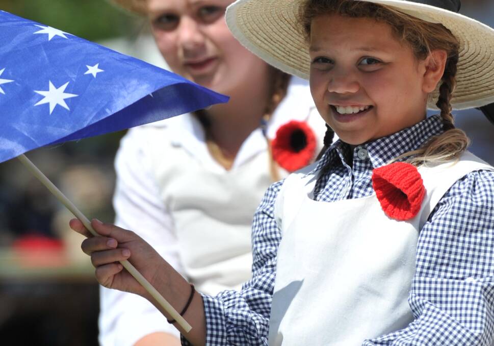 Lest we forget: Tootsie Lamb, 10, was part of the RSL Commemorative Rural Youth Choir at last year's Remembrance Day ceremony at the Victory Memorial Gardens. 