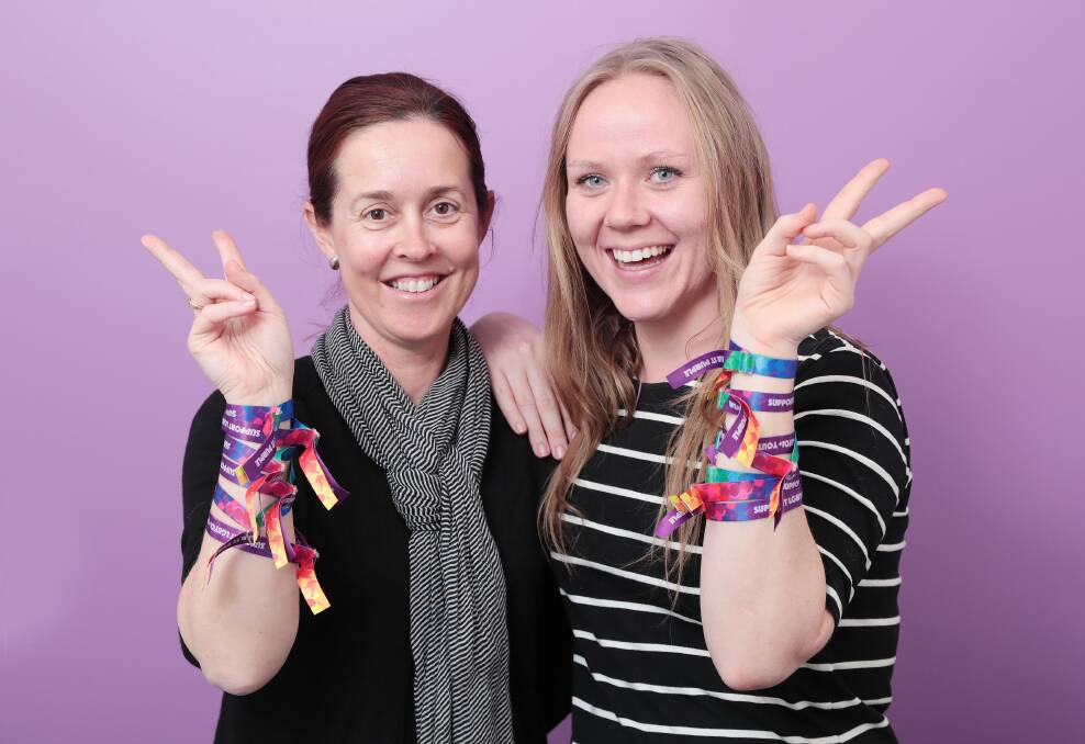 Shades of acceptance: Headspace Wagga clinical leader Kylie Hamblin and community engagement officer Sarah Groves are asking city residents to Wear it Purple on Friday. Picture: Kieren L Tilly