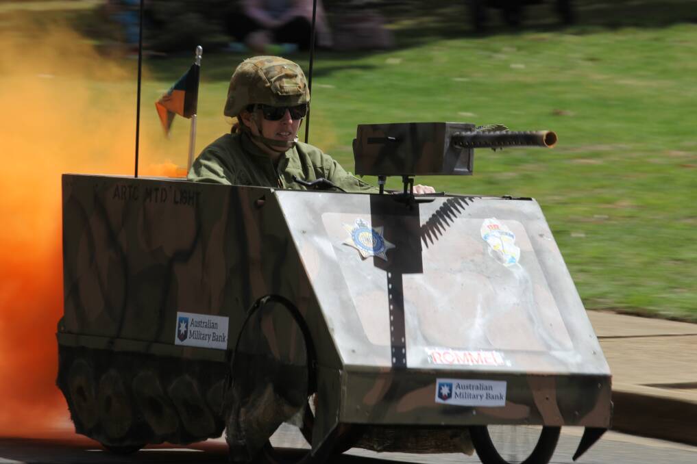 For the fun: Lance-Corporal Angelina Kopanakis dove behind the wheel of her team's tank-inspired vehicle to conquer Kapooka's first racing event in 20 years.